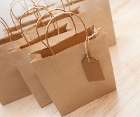Paper bags to represent celebrating small business saturday at Timber Hill Winery