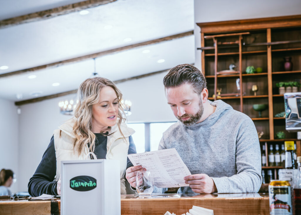 Guests enjoying wine tasting at Timber Hill Winery tasting room in Milton, Wisconsin